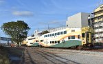 Southbound Sunrail Train # P331 passes alongside the Colonial Opas very close to Downtown Orlando 